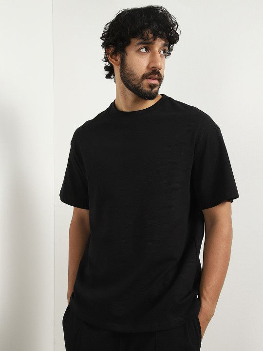 TP1sDmdF_8c2d04ad661c4eea9c668f9fe76cec82.jpg Oversized Textured T-shirt and Joggers Co-ord Set - Image 1